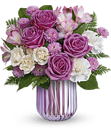 Deluxe size, 12 3/4 inches height and 12 and a half inches wide.